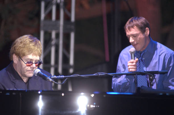 Elton John & Robert Downey Jr. performing at the Silver Lining Benefit