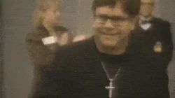 Elton John receiving the MusiCares 
Person of the Year award, 2000
