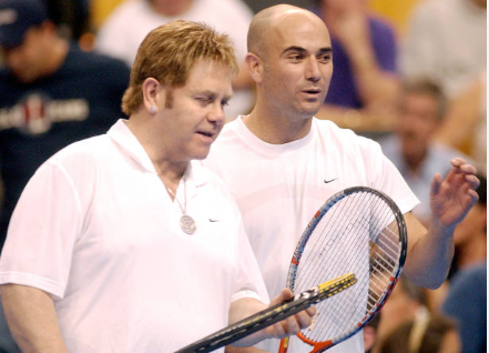 Elton John and Andre Agassi at Smash Hits charity tennis event, Boston, September 25, 2003