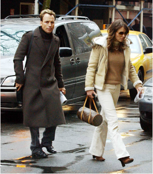Actress Elizabeth Hurley walks with David Furnish after dining at Bilboquet restaurant, New York City, January 31, 2003