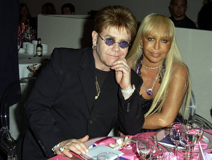 Elton John and Donatella Versace during Cinema Against AIDS 2003 at Cannes