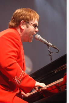 Elton John performing live onstage at Wembley Arena, United Kingdom