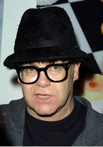 Elton John attending David LaChapelle’s photographic exhibition at the Barbican, London