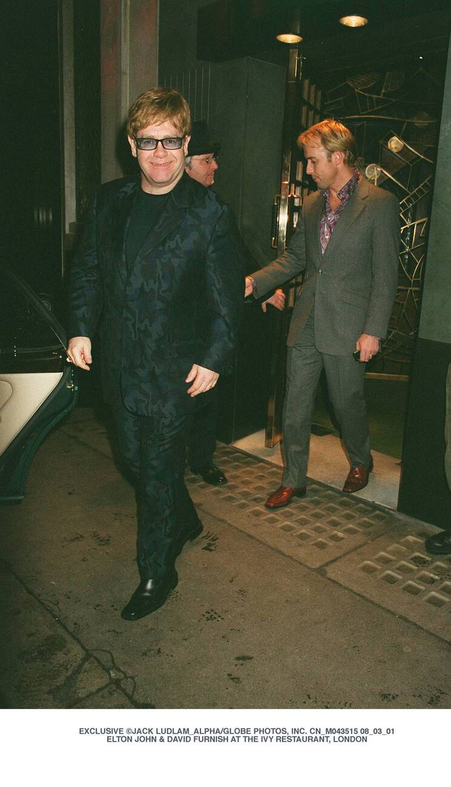 Elton John and David Furnish at The Ivy Restaurant, London - March 8, 2001