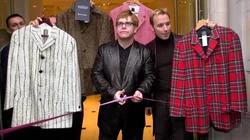 Elton John and David Furnish opening 'Out the Closet III' in London, October 29, 2000