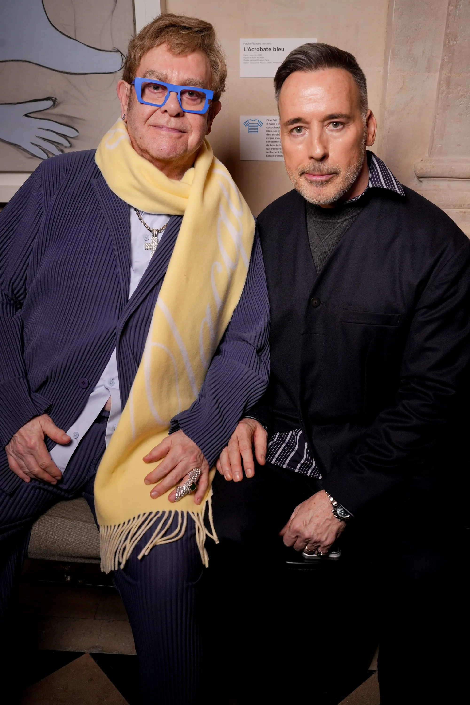 Elton John and David Furnish at the Jacquemus show in Paris