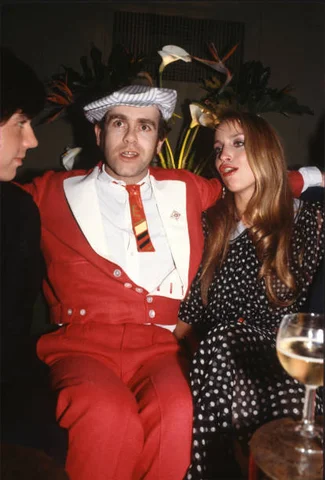 John & Hall At Xenon View of English musician Elton John and American fashion model Jerry Hall (right) as they attend a party (in honor of Roberta Flack) at the Xenon nightclub, New York, New York, June 12, 1978