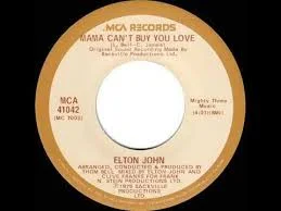 Aug 1979 UK 45 Rocket XPRES20 (did not chart)  MAMA CAN'T BUY YOU LOVE (4:03) *Strangers (4:40) Withdrawn single, 20 copies only.