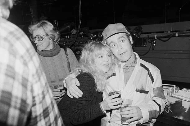 Elton John And Goldie Hawn In Embrace (Original Caption) 10/18/1979-New York, NY: British rock star Elton John hugs actress Goldie Hawn at Studio 54 here. They were celebrating John's opening show at the Palladium, Oct. 18, 1979.