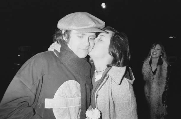 02/20/1979: Elton John and a fan at Theatre des Champs Elysees.