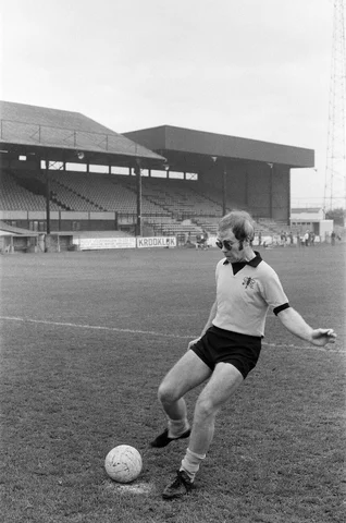 Elton John, just back from a tour of America, wants to be a director of Watford FC. He has always been a fan, and has just been made a vice president. Pictured at Watford to meet and train with the players to keep fit. 7th November 1973.