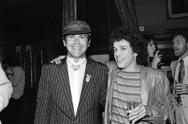 Elton John and Leo Sayer attending a House of Commons reception, invited along with other pop stars by the Minister for the Arts , Norman St John-Stevas. 3rd August 1980.