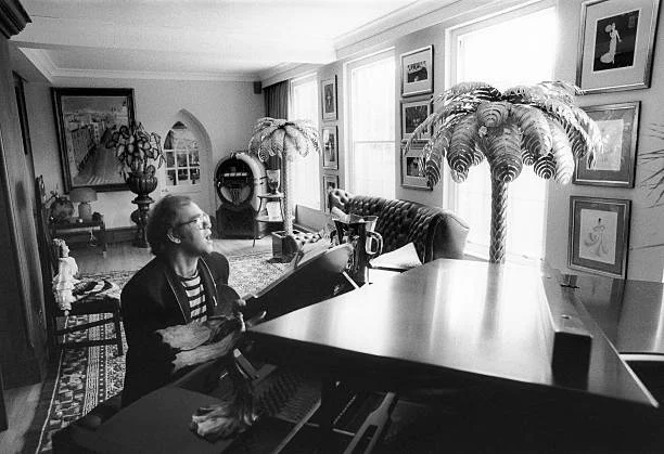 WINDSOR - JUNE 4: Elton John at his home in Windsor on June 4 1981 during filming for a videogram
