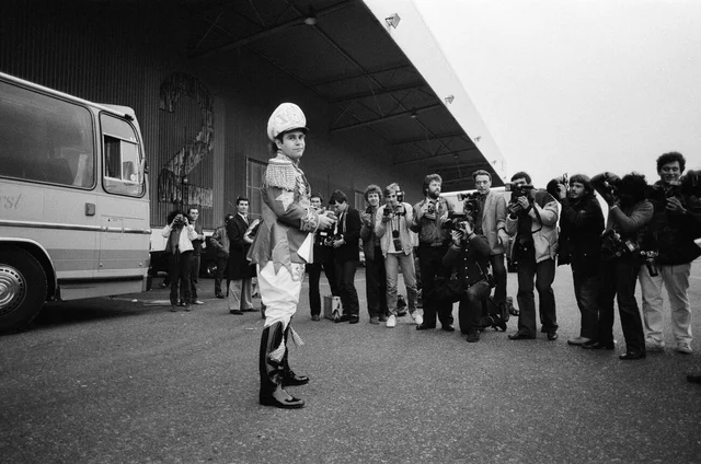 elton john pictured before he sets off on his first major british tour for five years he is dressed in one of the outfits he will be wearing on the tour 31st october 1982