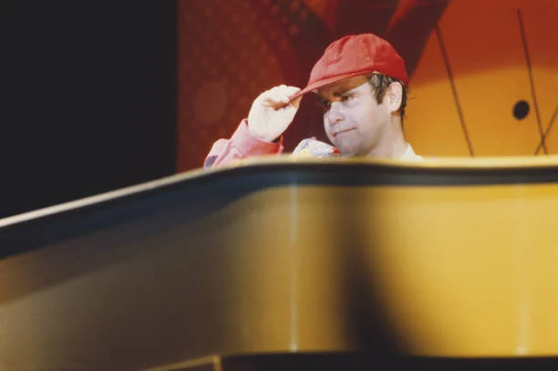 English singer and pianist Elton John in concert at the Hammersmith Odeon, London, 16th December 1982