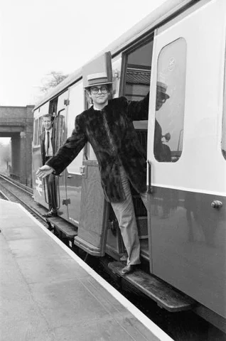 Elton John opens Watford Stadium Halt railway station Pop star and Watford FC Chairman, Elton John, opens the new Watford Stadium Halt railway station. It will serve Vicarage Road stadium, home of Watford F.C, 4th December 1982.