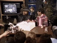 Molly Meldrum presents Elton John with his birthday cake (Countdown 03-28-1982)