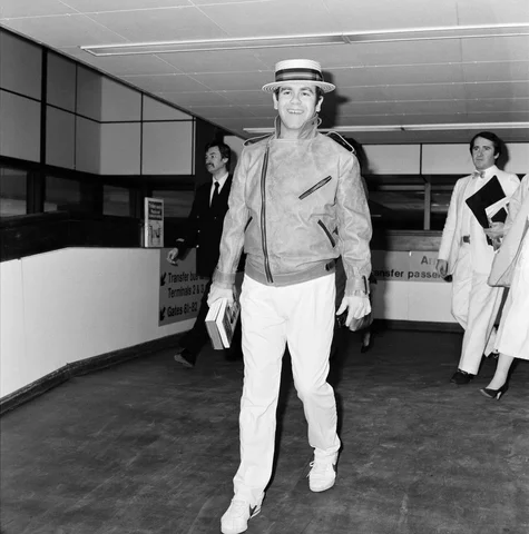 The departure of Elton John to Tunis for a Cartier party. 29th March 1983.
