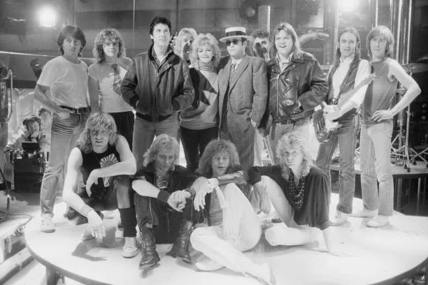 Channel 4 Christmas Show Channel 4 Christmas Show performers, group shot, UK, 12th December 1984; including Elton John, Def Leppard group members, Meat Loaf, Bonnie Tyler, Shakin' Stevens and Status Quo.