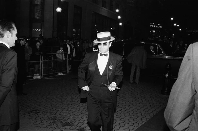 Elton John arriving at the premiere of "The Last Starfighter" in London. 11th December 1984.