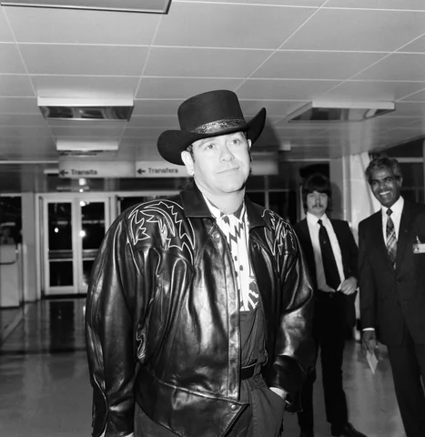 Elton John leaving Heathrow Airport for New York on Concorde. 13th August 1984.
