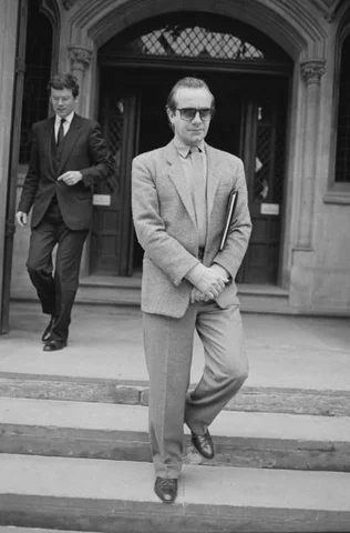 Bernie Taupin At Court English lyricist Bernie Taupin at the High Court in London, UK, 4th June 1985. He and his musical collaborator Elton John are suing their former manager Dick James, for a larger share of the profits from their early hits