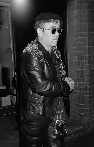 LONDON, UK. October 19, 1986: Elton John at a party at Stringfellows in London