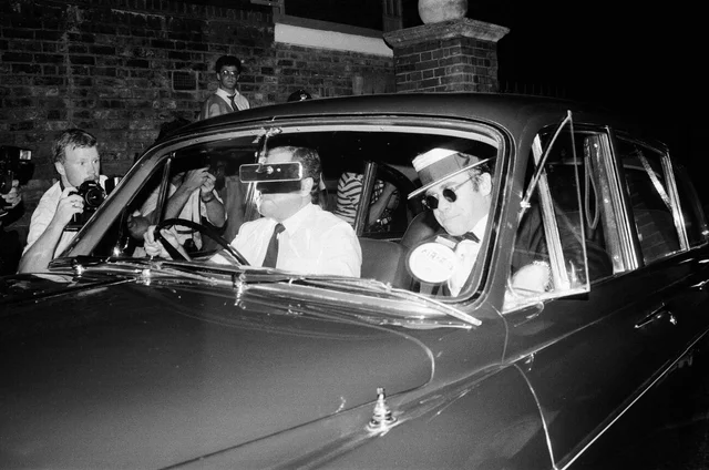 Elton John arriving at Prince Andrew's stag party. 15th July 1986.
