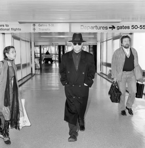 Elton John at Heathrow Airport, London. 26th August 1987