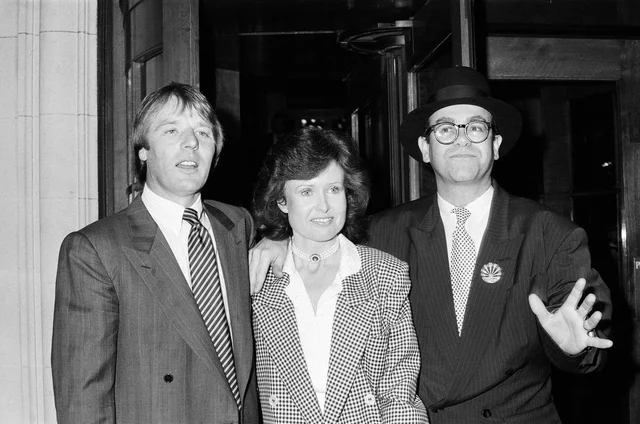 Elton John presents Watford FC's new manager, Dave Bassett, at a London reception. 18th May 1987.