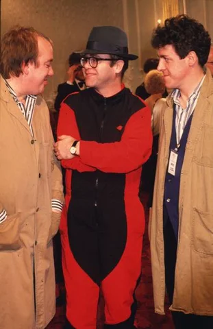 Smith & Jones 4th December 1987: British actor and comedian Griff Rhys-Jones and Mel Smith, stars of the new TV comedy series 'The World According To Smith and Jones' with singer-songwriter Elton John at the Paladium.