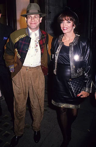 Elton John and Joan Collins at Langan's Brasserie Elton John and Joan Collins during Elton John and Joan Collins at Langan's Brasserie at Langan's Brasserie in London, Great Britain.