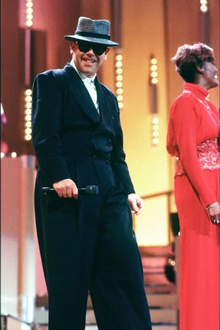 Elton John performs at a gala for AIDS sponsored by Dionne Warwick and Showtime at the John F. Kennedy Center for the Performing Arts in Washington, DC on June 12, 1988.
