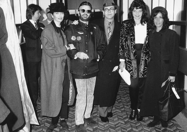 Elton John with wife and friends including Ringo Starr about to board Concorde. 21st January 1988.