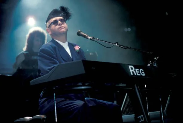 October 1 - 10, 1988 - ir Elton Hercules John is shown performing on stage during a live concert appearance on October 7, 1988 in Hartford, Connecticut.