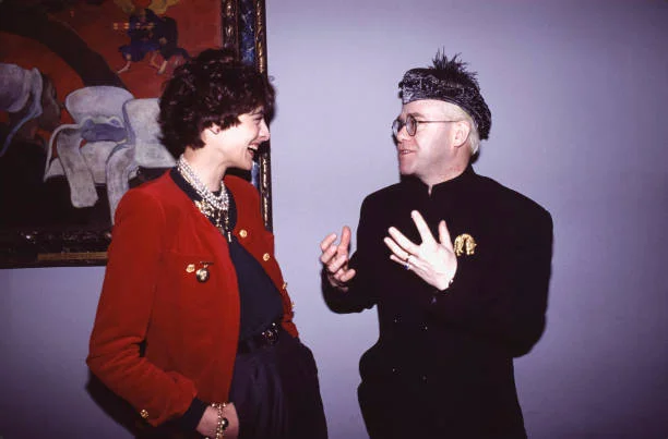 Inès de La Fressange and Elton John in 1989