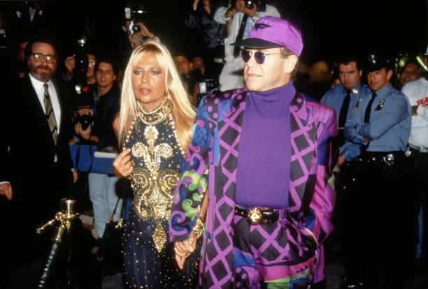 Elton John and Donatella Versace... NEW YORK - OCTOBER 22: Elton John and Donatella Versace on October 22, 1991 in New York.