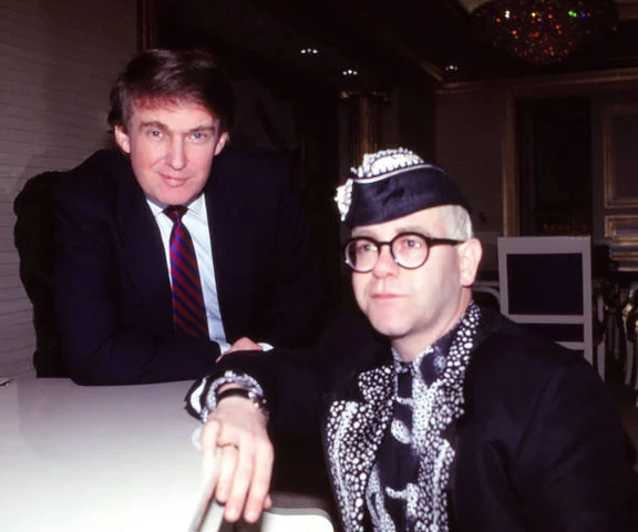 Donald Trump And Elton John In Atlantic City ATLANTIC CITY, NJ - MAY 18: Businessman Donald Trump and Singer Songwriter Elton John in Suite by Piano at The Taj Mahal Casino Hotel in Atlantic City, New Jersey May 18 1990