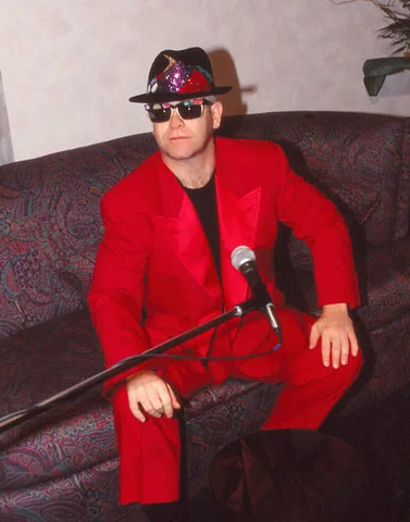 ATLANTIC CITY, NJ - APRIL 2: Singer Song Writer Elton John backstage prior to his performance at the opening of The Taj Mahal Casion Hotel in Atlantic City, New Jersey April 2 1990.