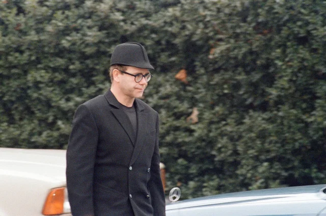 Elton John, at Freddie Mercury's funeral at West London Crematorium. 27th November 1991
