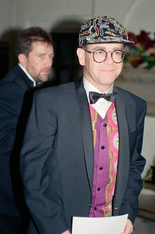 Elton John at a gala dinner in aid of the AIDS Crisis Trust in Whitehall. 6th November 1991.