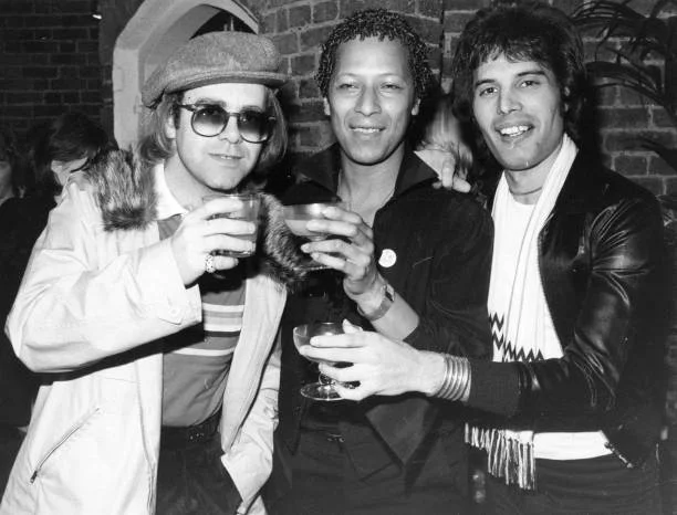 John, Peter & Freddie 31st October 1977: Singer songwriter Elton John (Reginald Dwight) with star of musicals Peter Straker, and Freddie Mercury (Frederick Bulsara, 1946 - 1991), singer with the group Queen