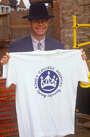 Elton John Opens New Aids Hospital Wing Sir Elton John visits a proposed wing for which he donated to patients fighting AIDS, in the summer of 1991, at Camberwell, south London England.