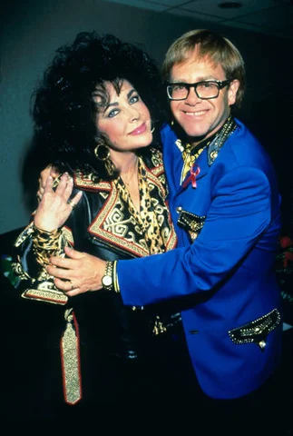 NEW YORK, NY - FEBRUARY 23: Elizabeth Taylor and Elton John backstage before Elton John performs at Shea Stadium on August 21, 1992 in New York City
