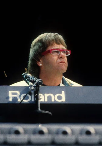 Elton John performs on stage at Feyenoord Stadium 'de Kuip', Rotterdam, Netherlands, 19th June 1992