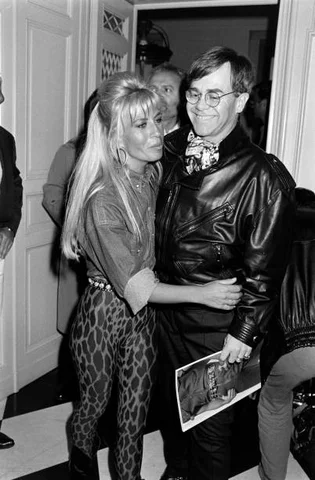 Versace Fall 1992 Menswear Collection Presentation Designer Donatella Versace and musician Elton John