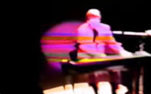 Elton John performing live at the Grand Ole Opry in Nashville, Tennesse for Dee Murray's Memorial on March 15th, 1992.3