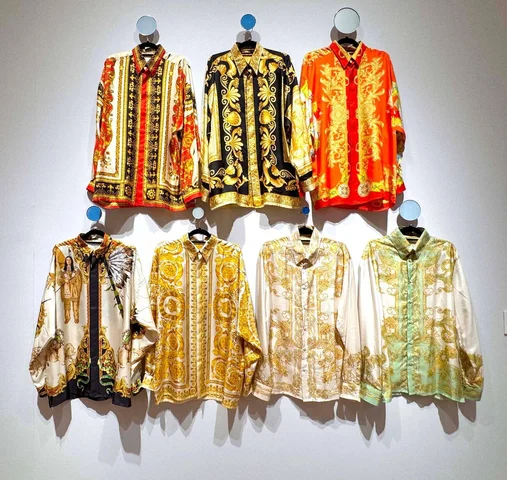 A group of Seven Silk Shirts Gianni Versace, circa 1993, estimate $4,000 - $6,000, seen at ""˜The Collection of Sir Elton John: Goodbye Peachtree Road' held at Christie's Rockefeller Center. Items are from Elton's former Atlanta home.