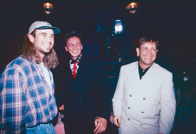 American tennis player Andre Agassi, singer Barry Manilow, and English singer and songwriter Elton John, ATP Awards, Planet Hollywood 1994