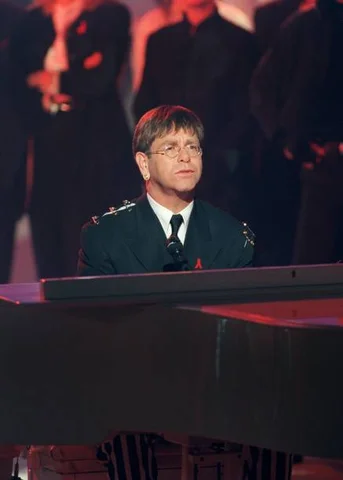 TELEVISION–AIDS–FIGHT Singer Elton John takes part in the special broadcast by six television channels, "Tous contre le Sida" ("All Against AIDS"), on April 7, 1994, live from the Zénith in Paris.